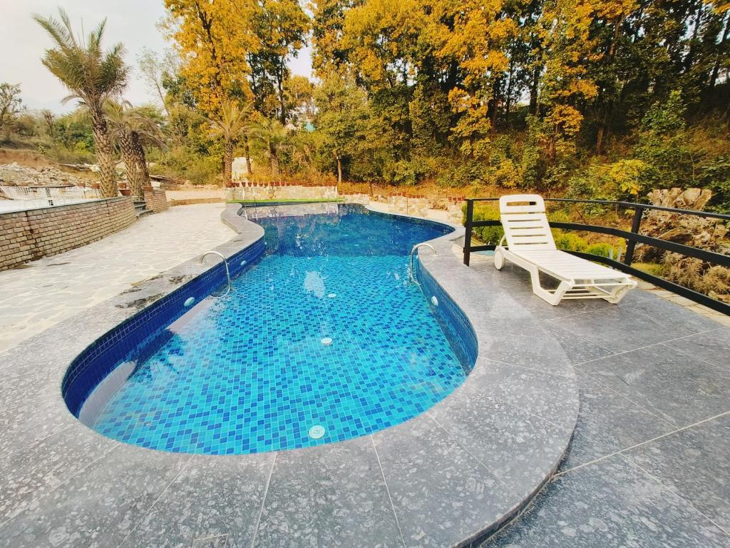 Hotel in Dehradun with Outdoor Swimming Pool Ataraxia - Boutique Resort & Spa