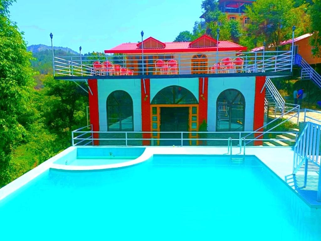 Luxury Cottage Resort Shimla Swimming Pool Aamod at Shoghi