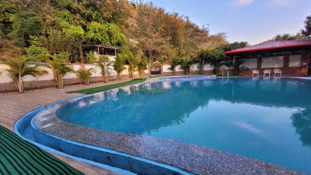 Nivasaa, The Nature's Home Hotel in Dehradun with Swimming Pool