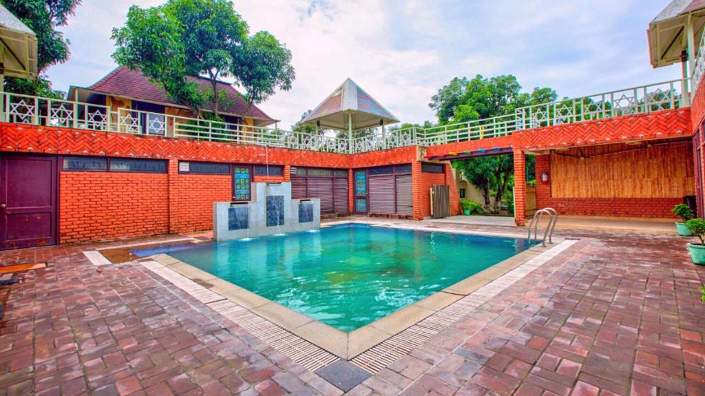 ShriGo Pyramid Home Divine - A Wellness Resort Hotel in Dehradun with Swimming Pool