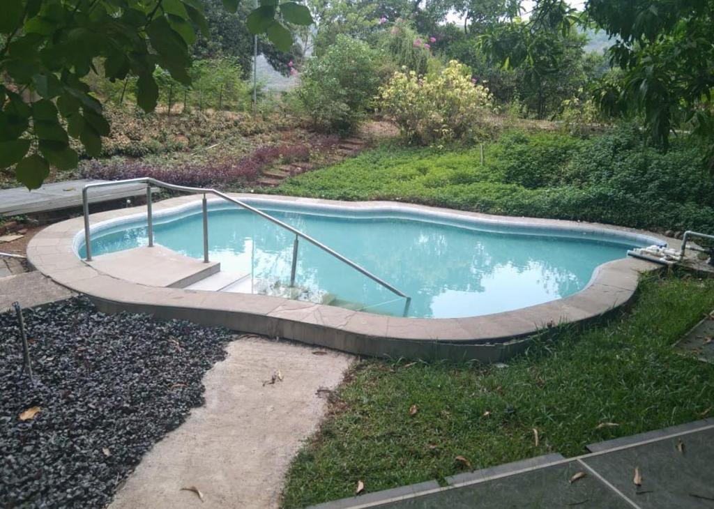The Homecoming Farmstay Karjat Hotel Swimming Pool